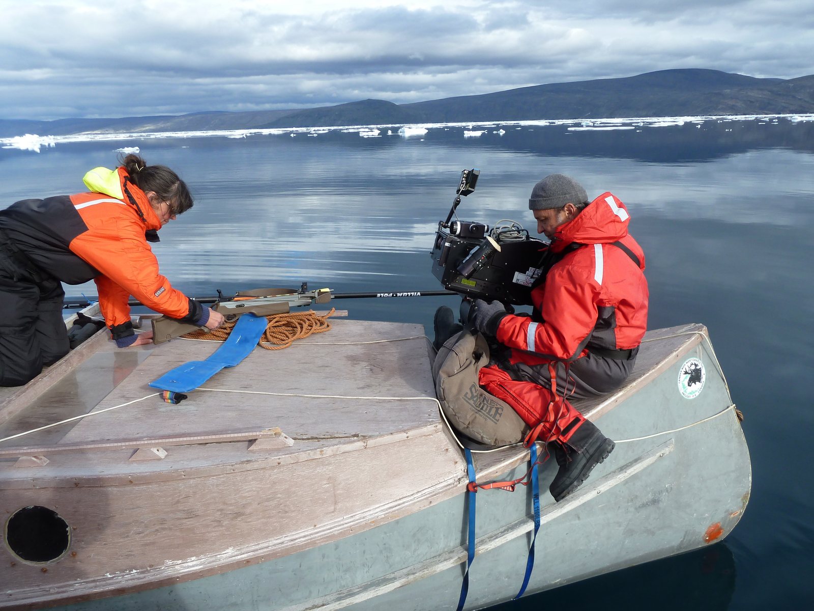 Camera crew working from a boat during Arctic field production